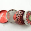 Grinder Atomic Rouge motif feuille de canabis